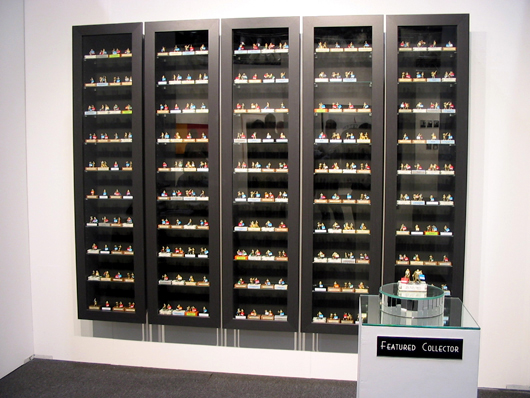 Jennifer Dalton, The Collector-ibles (installation view @ PULSE art fair), 2006, Mixed media (cabinets, figureines, pedestal), Edition of 3, dimensions variable